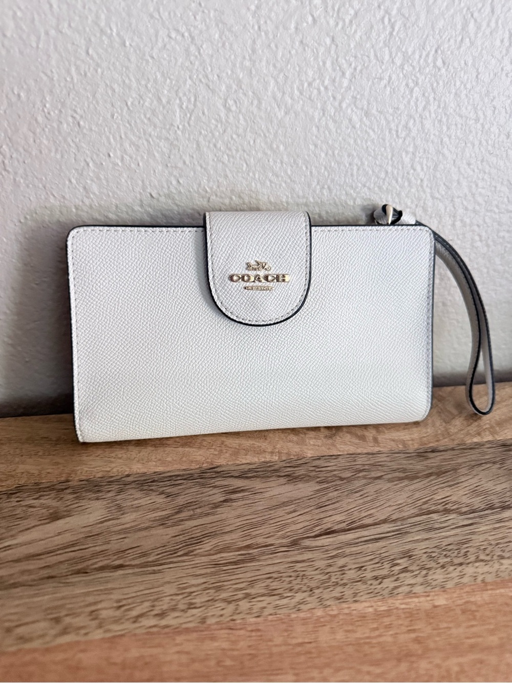 Coach White Leather Wristlet with Gold Emblem